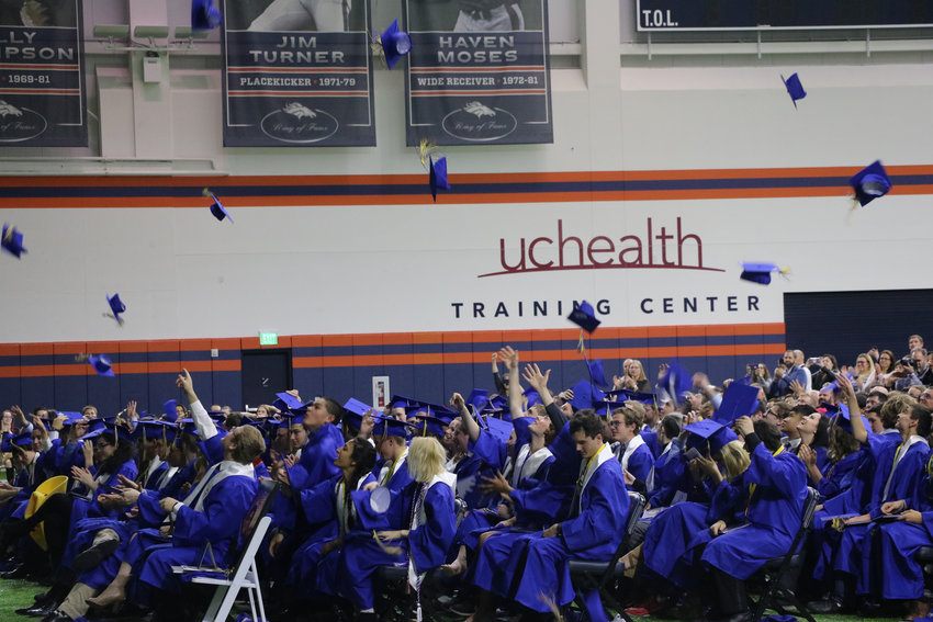 Graduates of STEM School Highlands Ranch close one chapter at a May 20 commencement ceremony at the Broncos Training Facility.